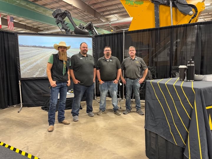 Day 2 at the booth — the Mandako and QDM team between conversations with growers.