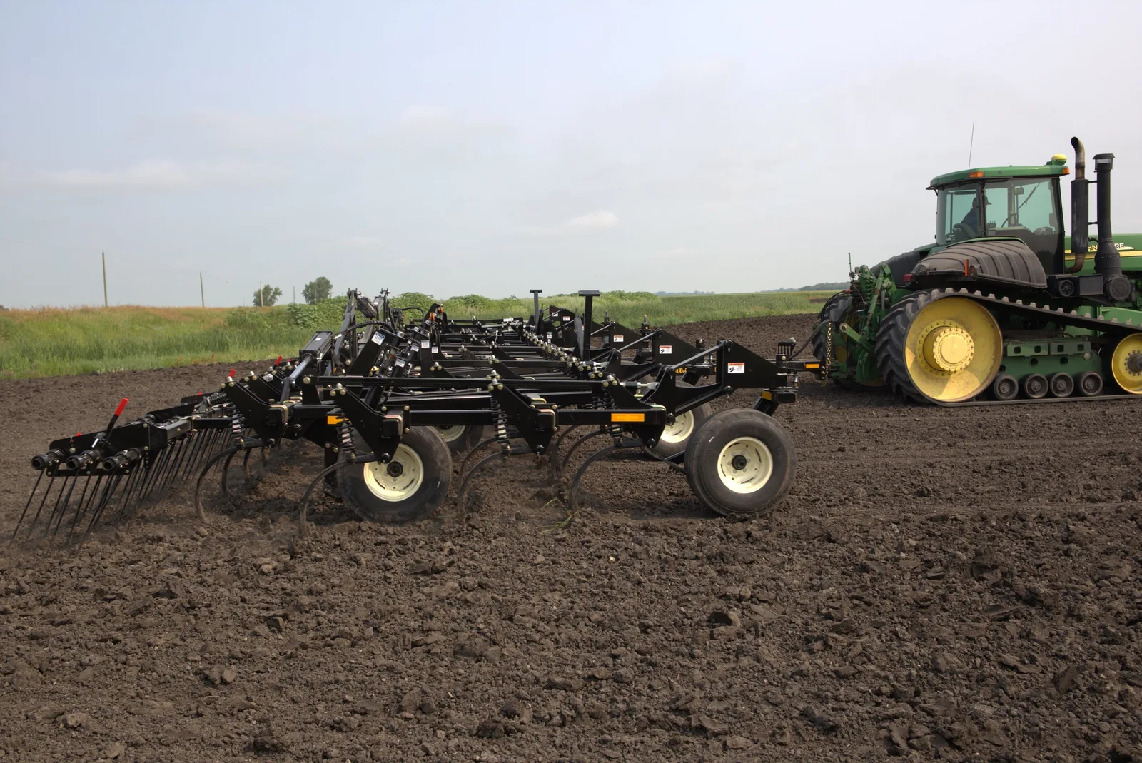 Mandako Chisel Flex pulled by green tractor across prepared field